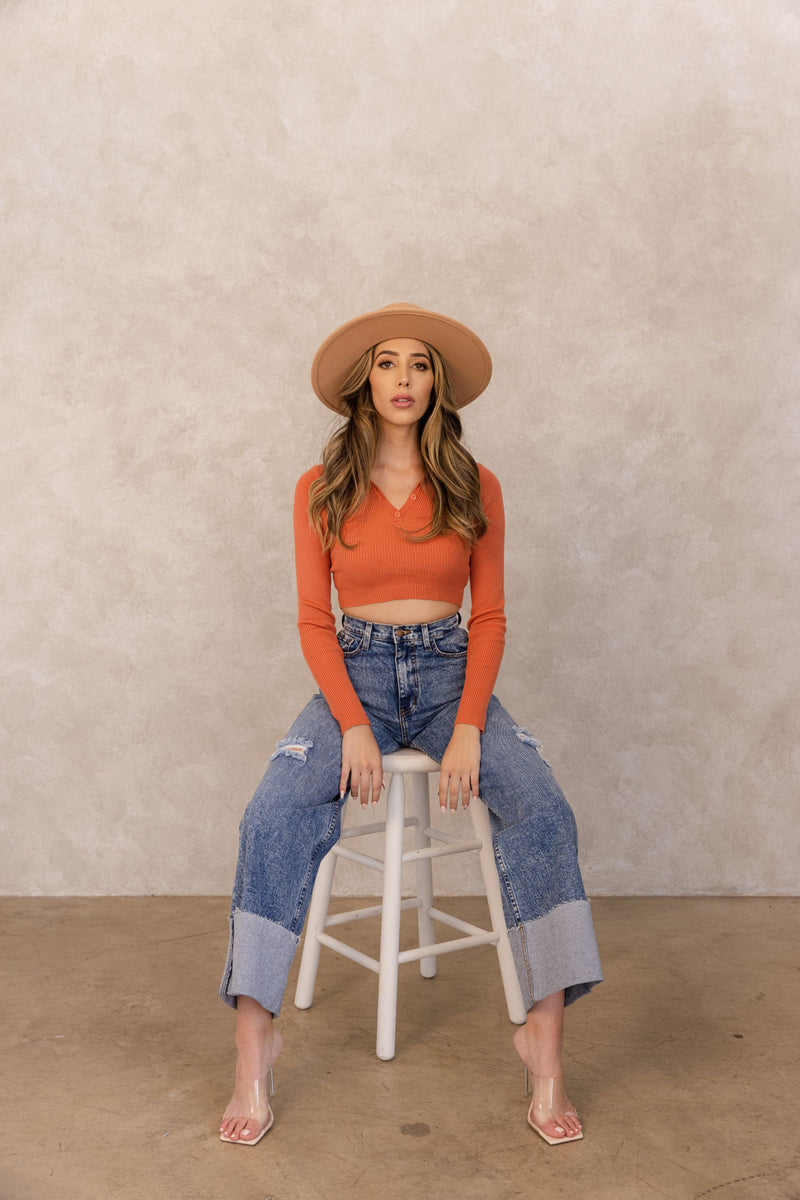 Our vintage stone washed high rise jeans serve major circa 90's vibe, with a perfect form fit. These jeans can be one of yours and your moms favorite styles! These jeans have an oversized wide cuff this look can be style for day or night. Have fun in our favorite mom jeans, the 90's Revival!