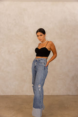 Our vintage stone washed high rise jeans serve major circa 90's vibe, with a perfect form fit. These jeans can be one of yours and your moms favorite styles! These jeans have an oversized wide cuff this look can be style for day or night. Have fun in our favorite mom jeans, the 90's Revival!