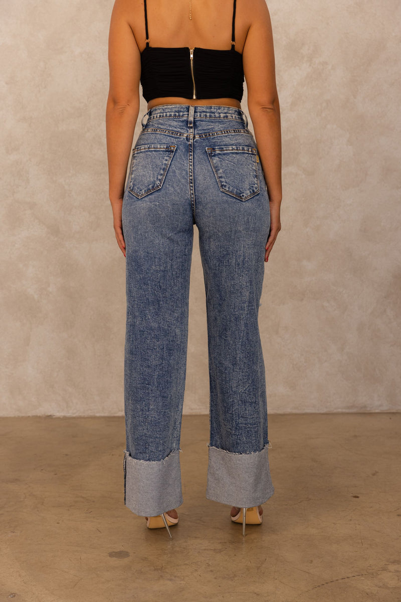 Our vintage stone washed high rise jeans serve major circa 90's vibe, with a perfect form fit. These jeans can be one of yours and your moms favorite styles! These jeans have an oversized wide cuff this look can be style for day or night. Have fun in our favorite mom jeans, the 90's Revival!